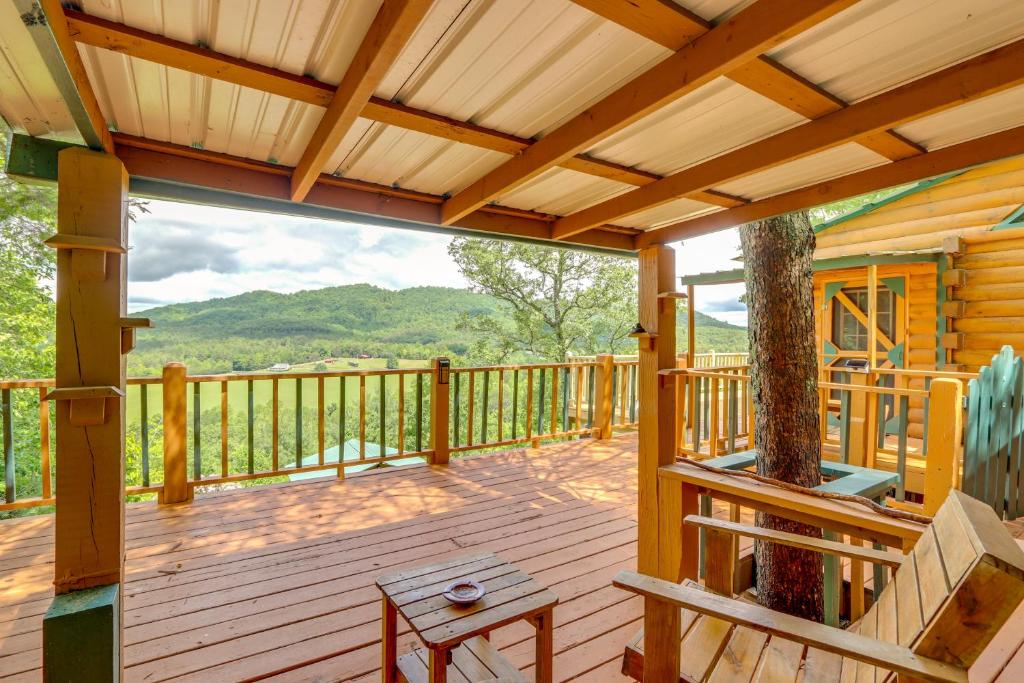 a deck with a view of the mountains at Secluded Mountain Cabin with Decks and Gazebo! in Brasstown