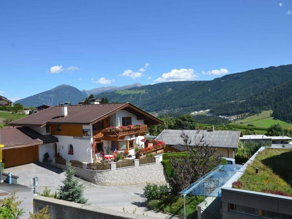 a house with a view of a mountain at Holiday apartment with 2 bedrooms in Fulpmes