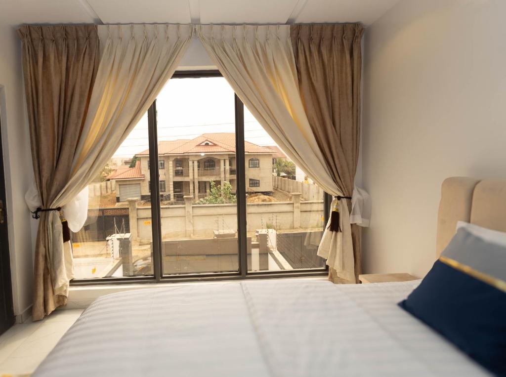 Ένα ή περισσότερα κρεβάτια σε δωμάτιο στο ProSpec Modern Homes