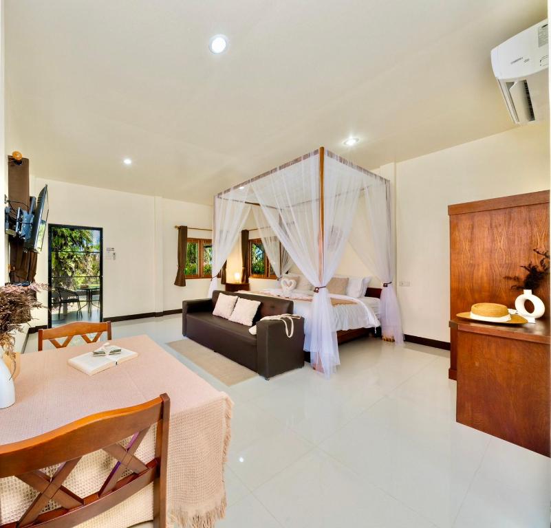 Ένα ή περισσότερα κρεβάτια σε δωμάτιο στο Green Garden House