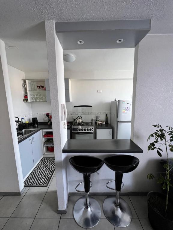 Kuchyň nebo kuchyňský kout v ubytování Depto. Arriendo Diario - La Serena