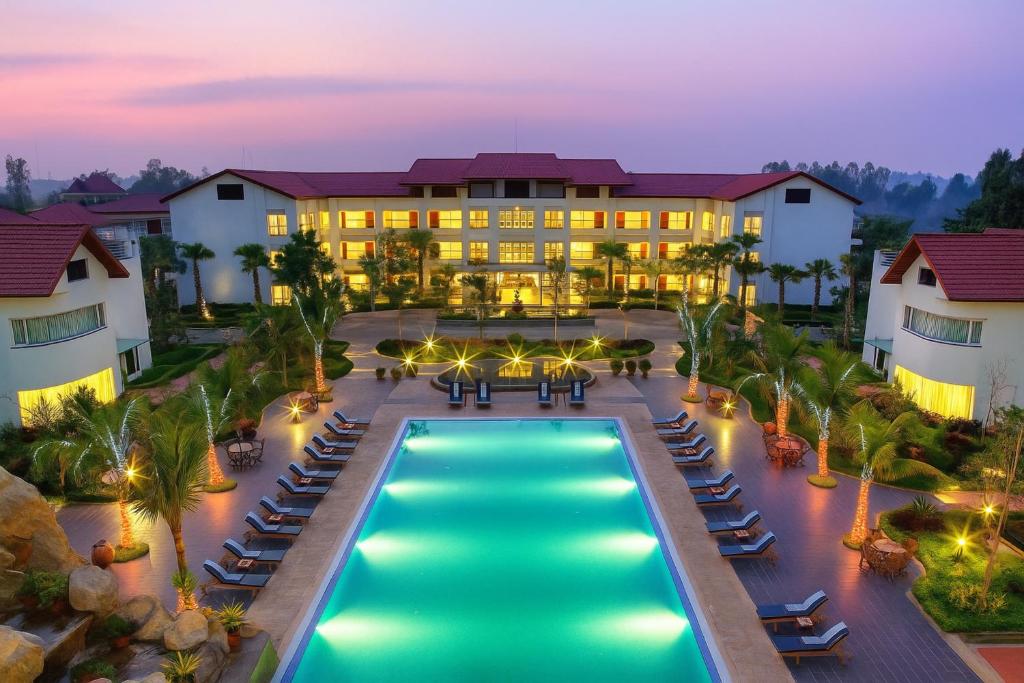 an aerial view of a resort with a swimming pool at EG Paradise Angkor Villa Hotel in Siem Reap