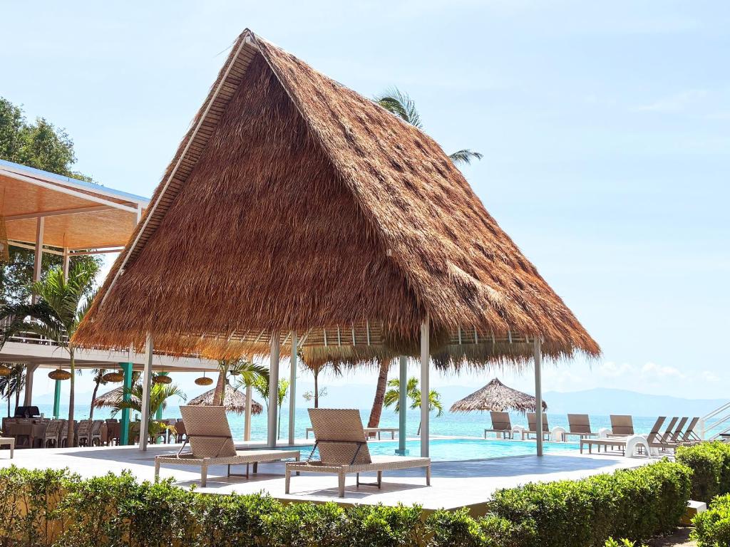 Bazén v ubytování Milky Bay Resort nebo v jeho okolí