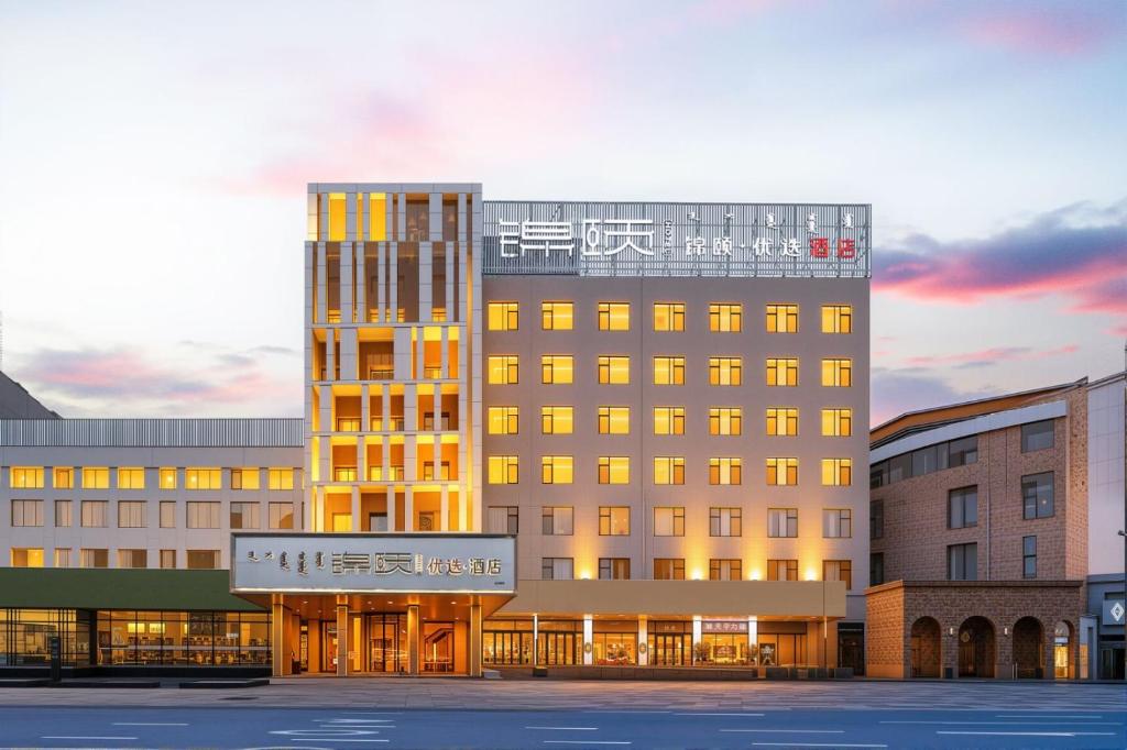 a rendering of a hotel with a building at Jin Yi Youxuan Hotel Baotou Wanda Plaza Branch in Baotou