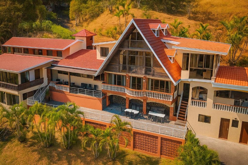 an aerial view of a large house at Hotel Mirador Mayday Mountain View in Alajuela City