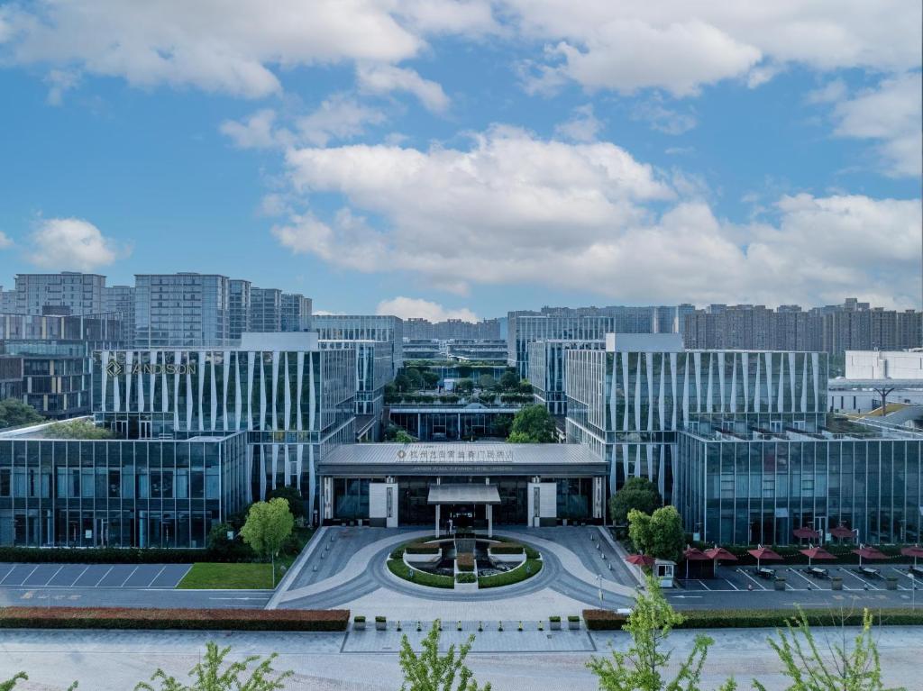 a view of a large city with a building at Landison Plaza E-Fashion Hotel Hangzhou in Hangzhou