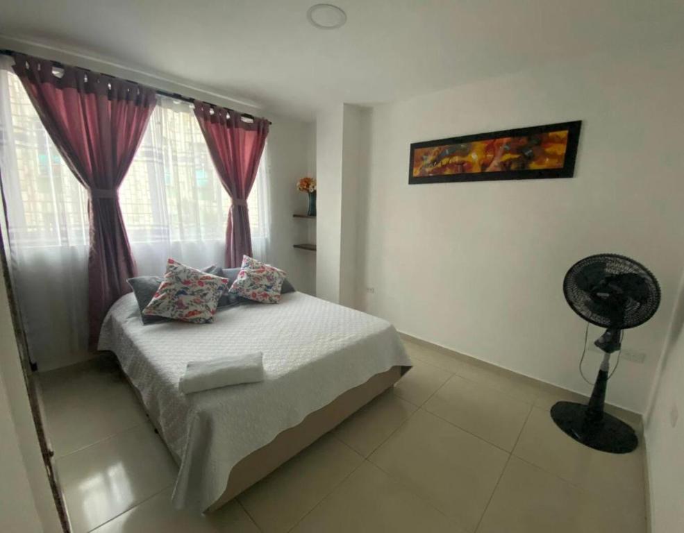 Postel nebo postele na pokoji v ubytování Confort y Ubicación Central - Apartamento en Bucaramanga - 2 Habitaciones