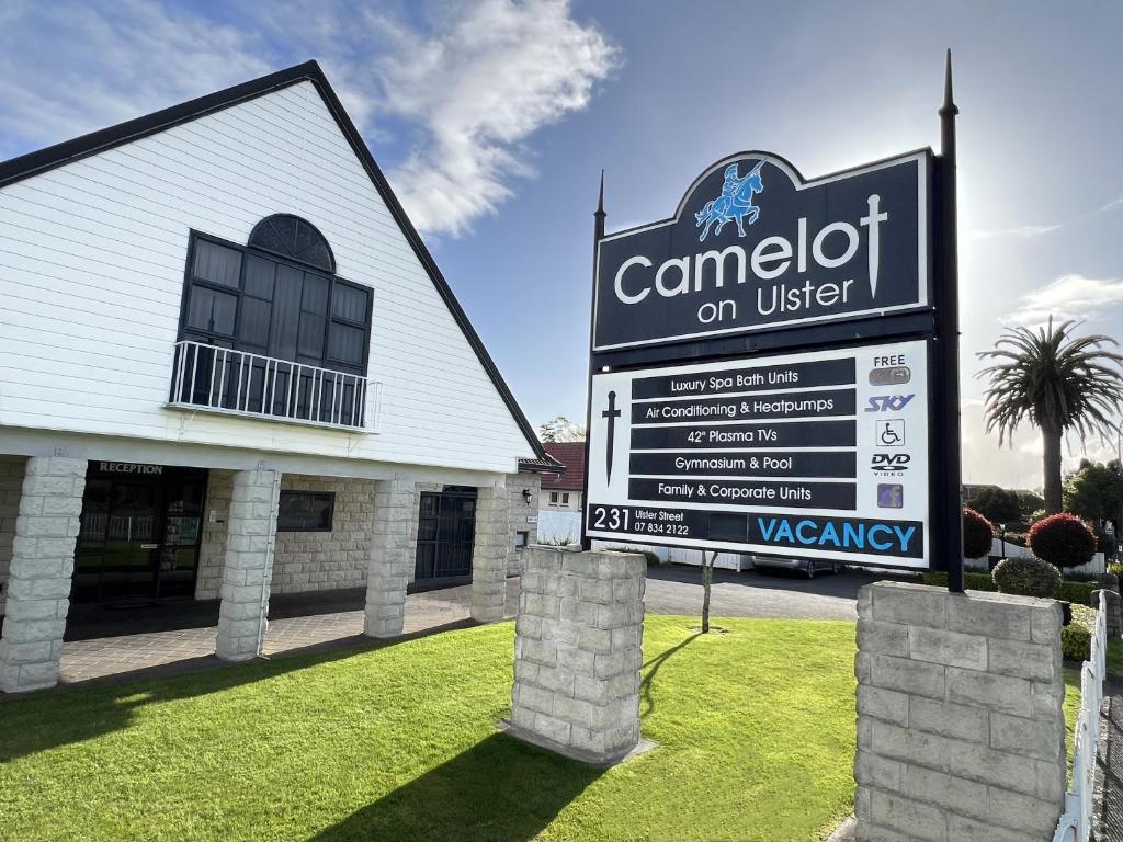 a sign in front of a building at Camelot On Ulster in Hamilton
