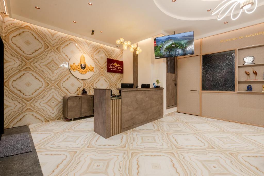 Μια τηλεόραση ή/και κέντρο ψυχαγωγίας στο Legacy Inn, Mysore