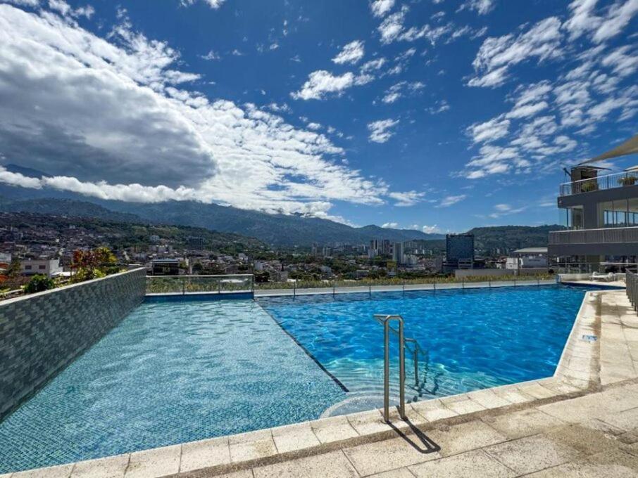 Bazén v ubytování Apartamento con Excelente Vista con Piscina, Jacuzzi, BBQ y Balcón nebo v jeho okolí