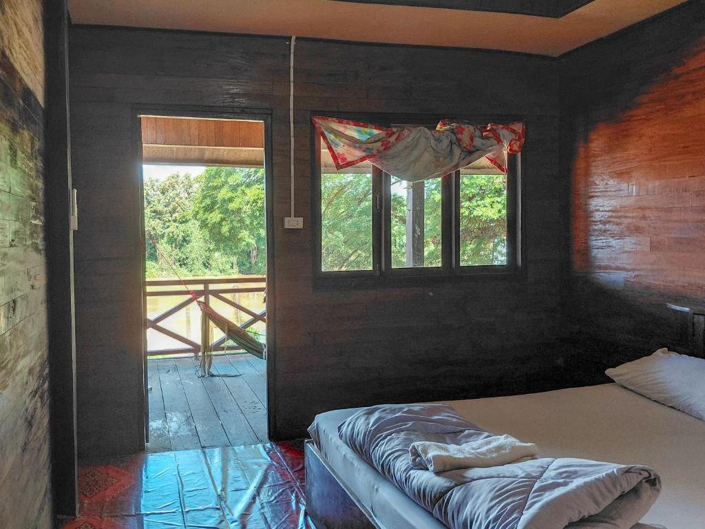 Ένα ή περισσότερα κρεβάτια σε δωμάτιο στο Mama Mon & Papa's