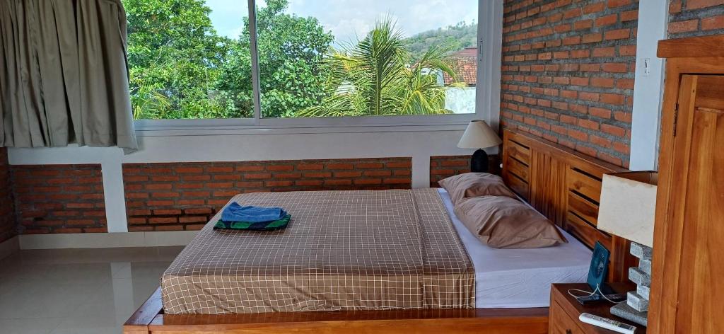 Amed Sari Beach Guesthouse - 海景豪华双人间 - 带阳台