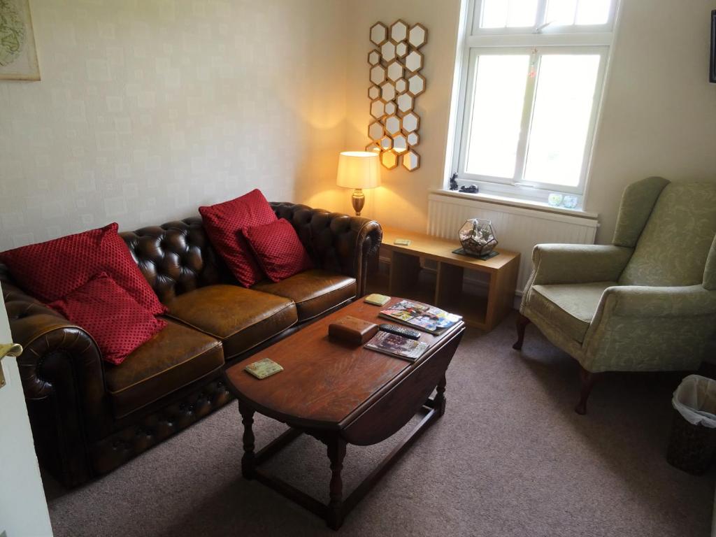 Posezení v ubytování Meadowcroft Guest House