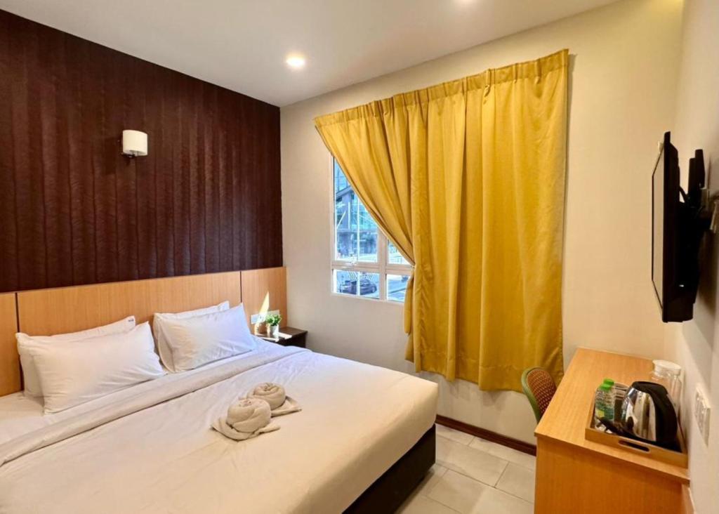 Ένα ή περισσότερα κρεβάτια σε δωμάτιο στο Swing & Pillows - TRX