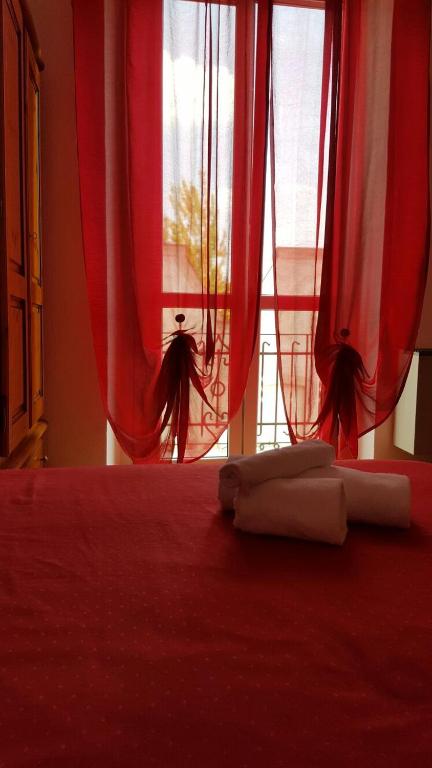 Postel nebo postele na pokoji v ubytování Hotel Calaluna