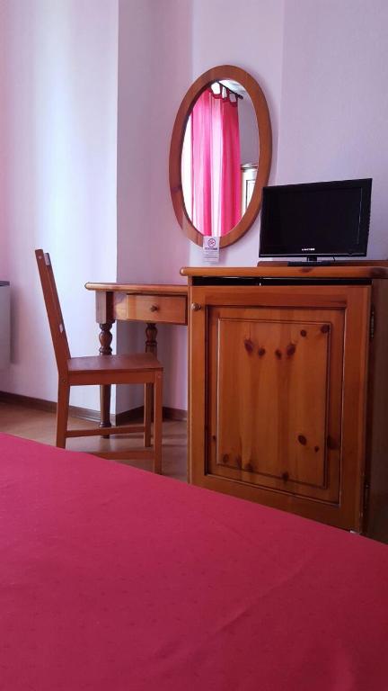 Postel nebo postele na pokoji v ubytování Hotel Calaluna
