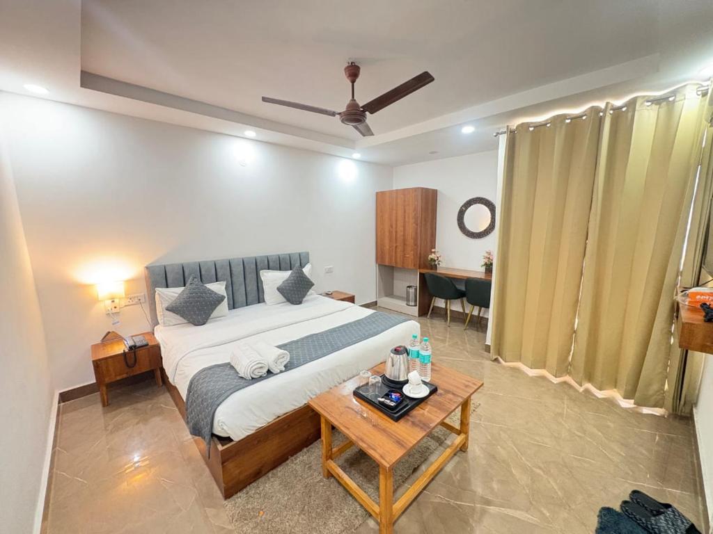 Ένα ή περισσότερα κρεβάτια σε δωμάτιο στο Hotel Breezy Heights