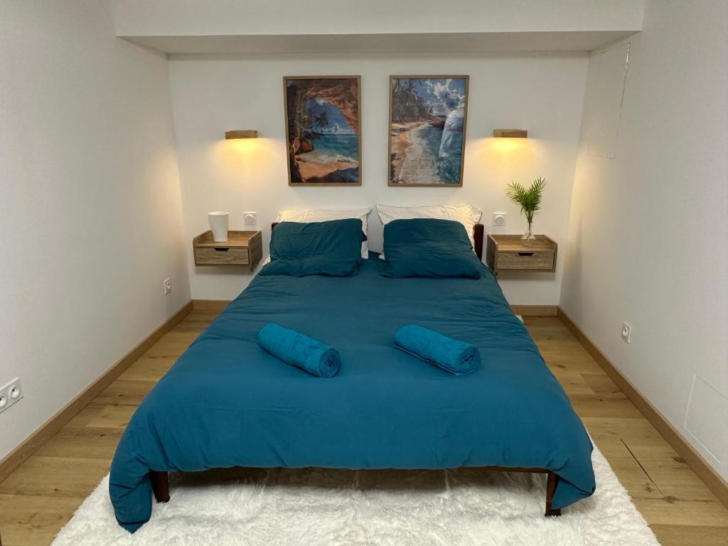 Postel nebo postele na pokoji v ubytování Jolie Chambre zen