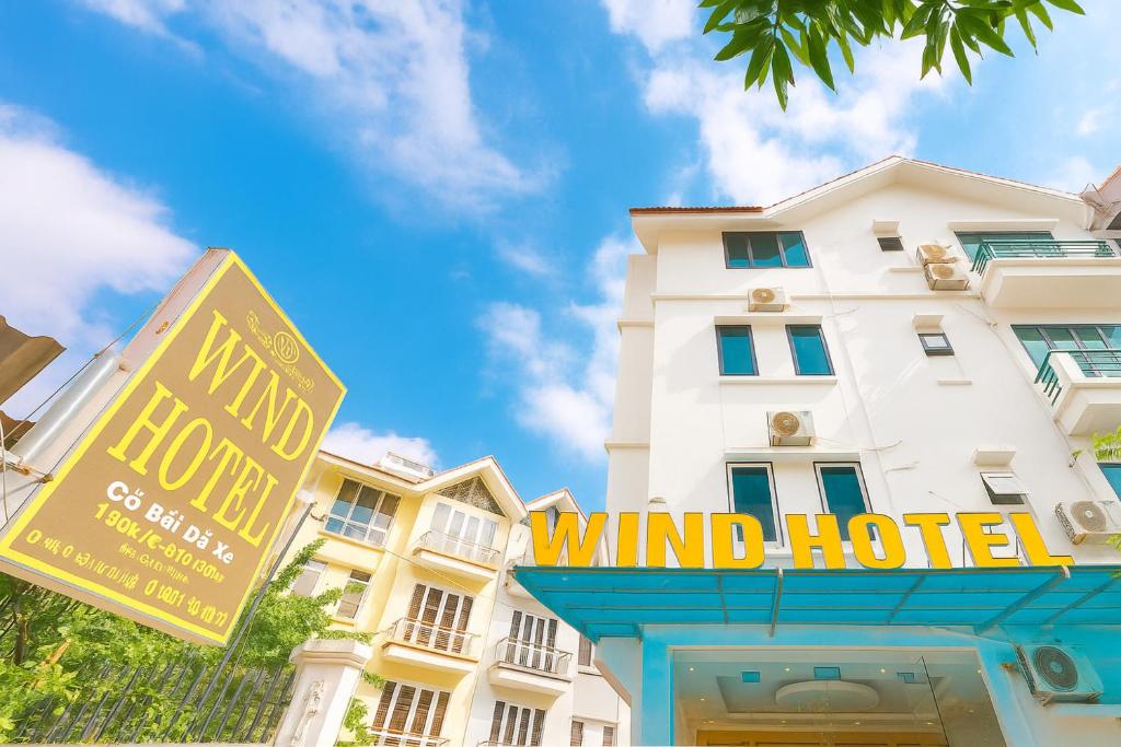a wind hotel sign in front of a building at Wind Hotel in Hanoi