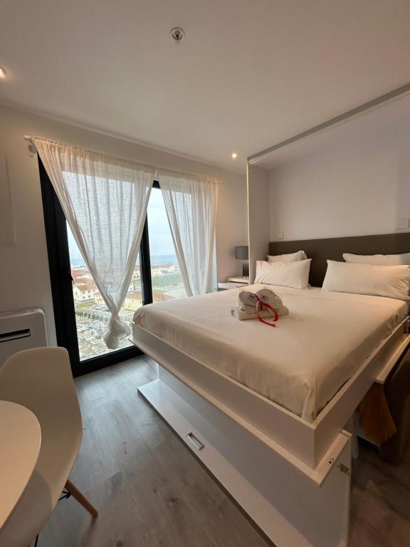 Ένα ή περισσότερα κρεβάτια σε δωμάτιο στο Hub Palace