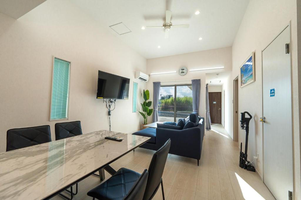 Et tv og/eller underholdning på ガーデンヴィラミヤコアネックスエー