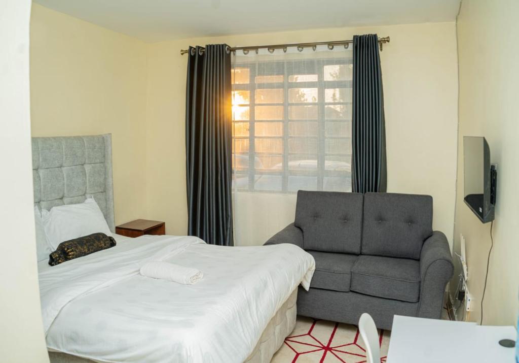 Postel nebo postele na pokoji v ubytování Safari Destination Homes