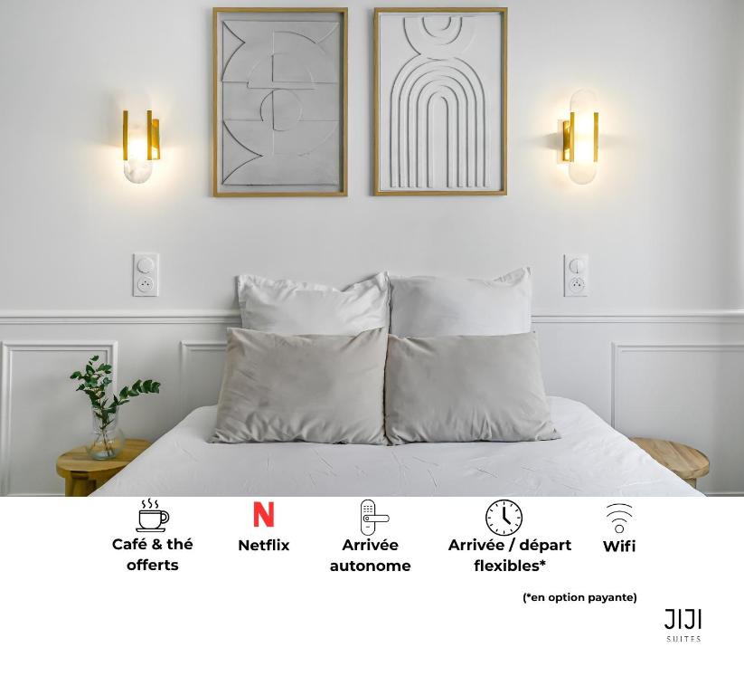 Postel nebo postele na pokoji v ubytování JIJI Suites