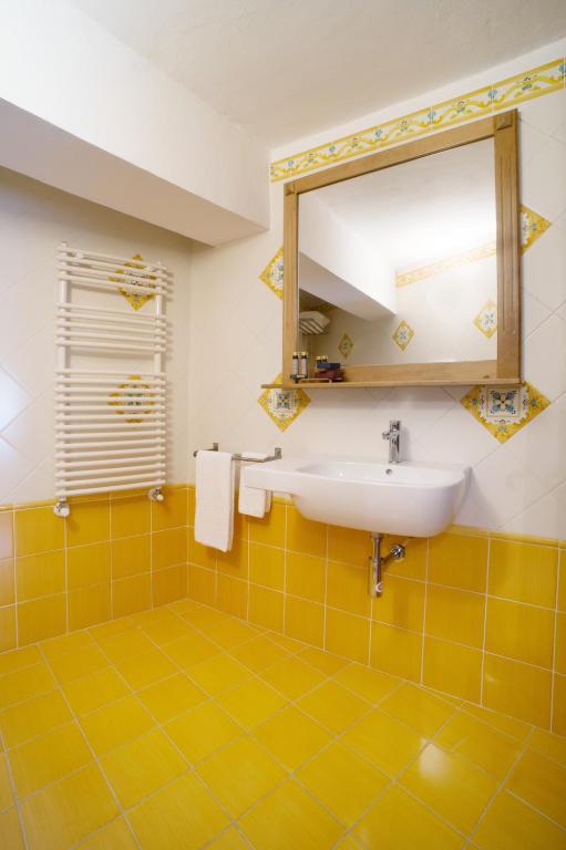 Koupelna v ubytování Dimora Storica Hotel Maccarunera