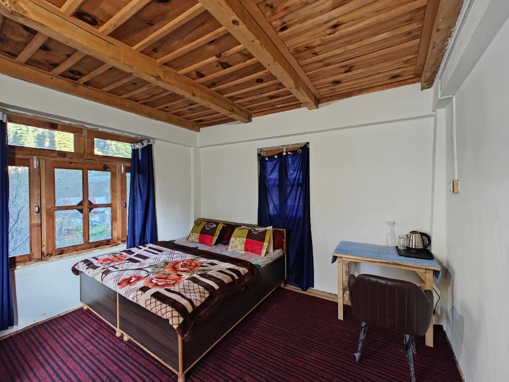 Postel nebo postele na pokoji v ubytování Solriddim Cafe & Stays