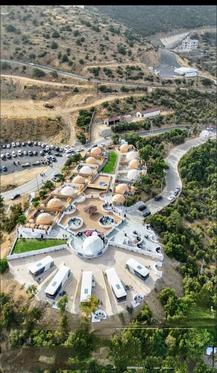an aerial view of a parking lot with rvs at ماكامايا Makamaya in Al Baha
