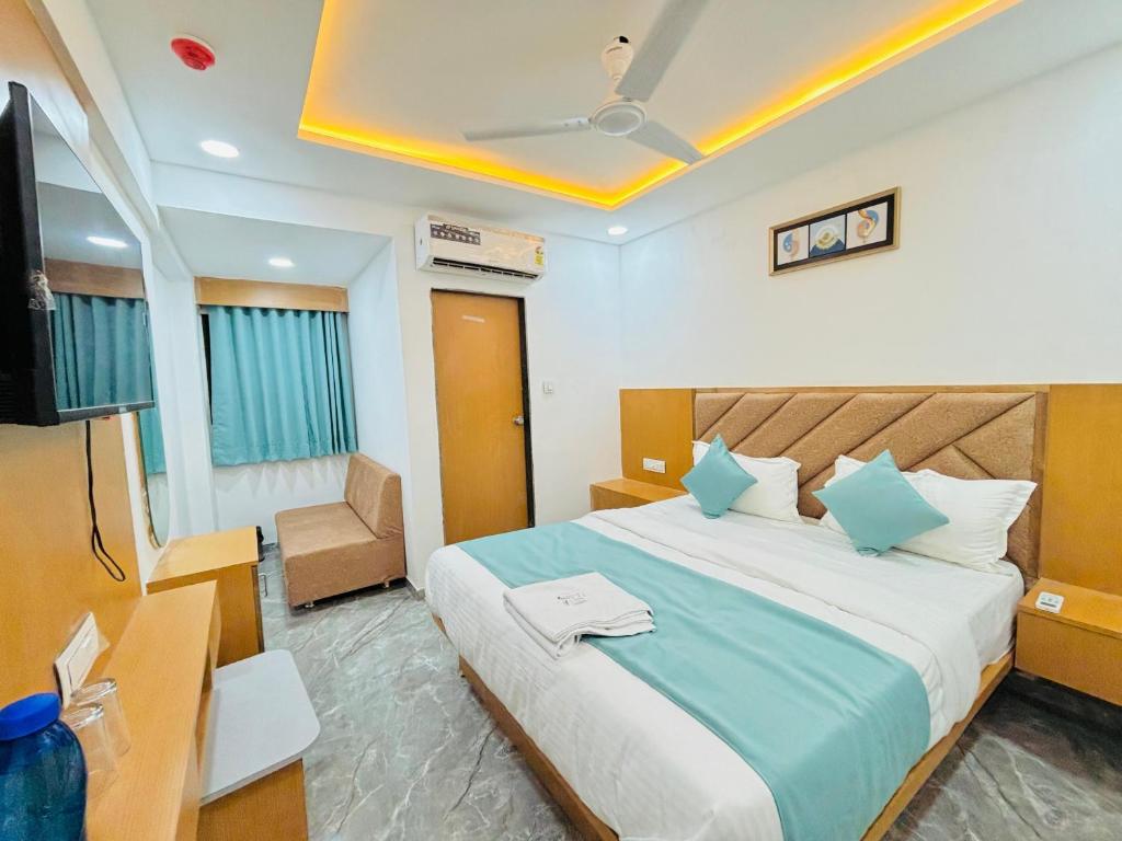 Postel nebo postele na pokoji v ubytování hotel sun pride