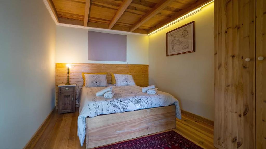 a bedroom with a bed in a room at The Goat's Place III in Gaula