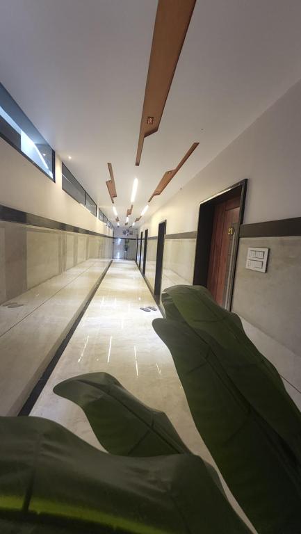 Ένα ή περισσότερα κρεβάτια σε δωμάτιο στο Hotel Anmol&Rooms