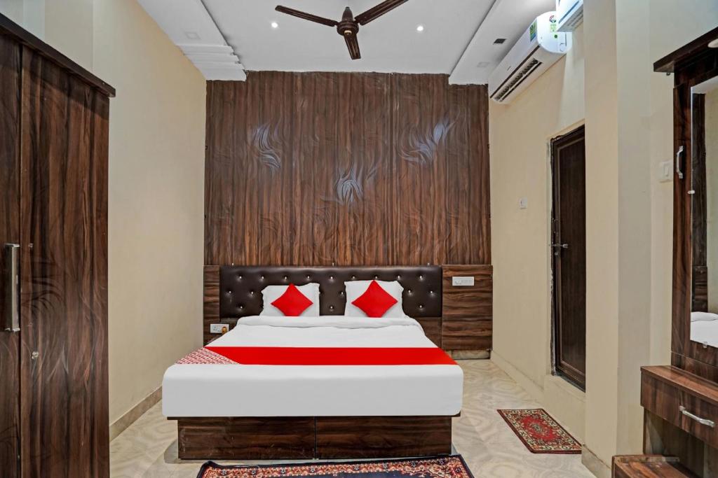 Ένα ή περισσότερα κρεβάτια σε δωμάτιο στο Super Hotel O Fortune Suites