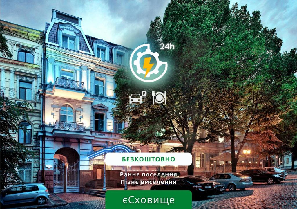 a building with a sign in front of it at Continental Hotel in Odesa