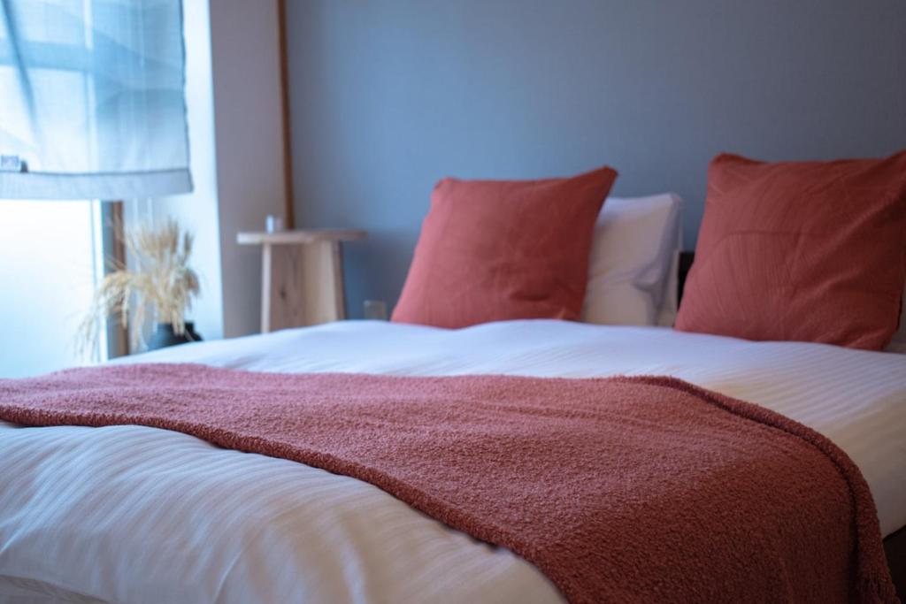 Ένα ή περισσότερα κρεβάτια σε δωμάτιο στο Howa Apt 303