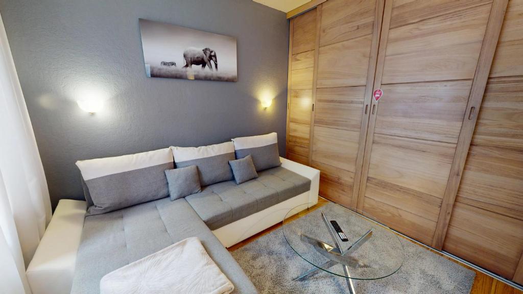 Posezení v ubytování au pied du Haut Koenigsbourg 1