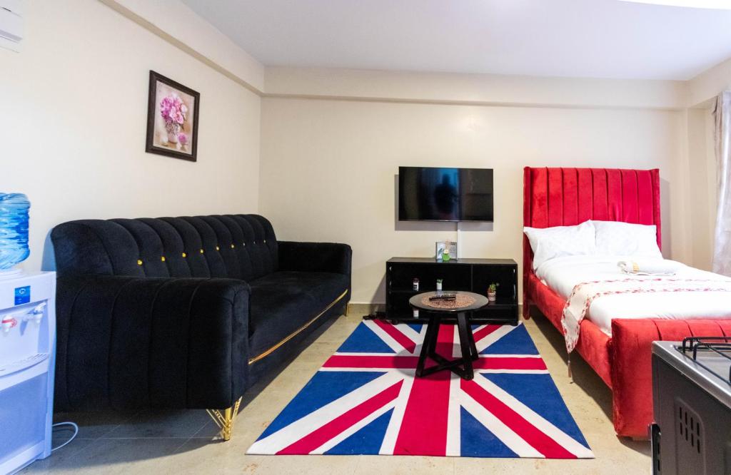 Postel nebo postele na pokoji v ubytování Burgundy Studio with free WI-FI