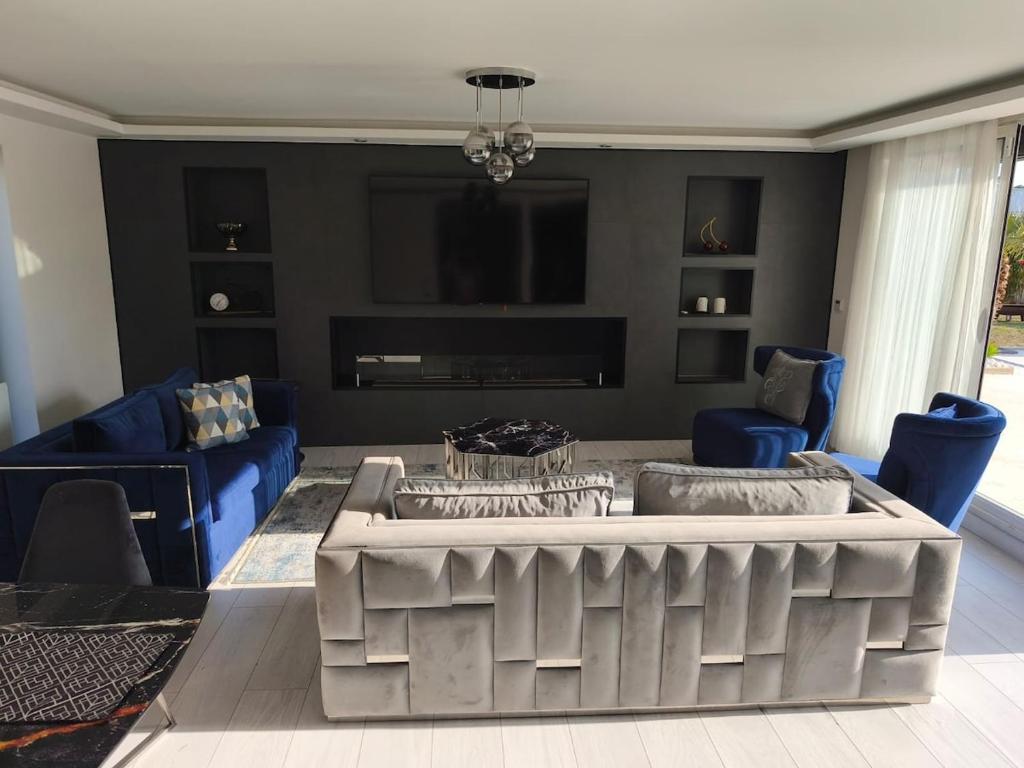 Posezení v ubytování Villa - piscine sans vis à vis