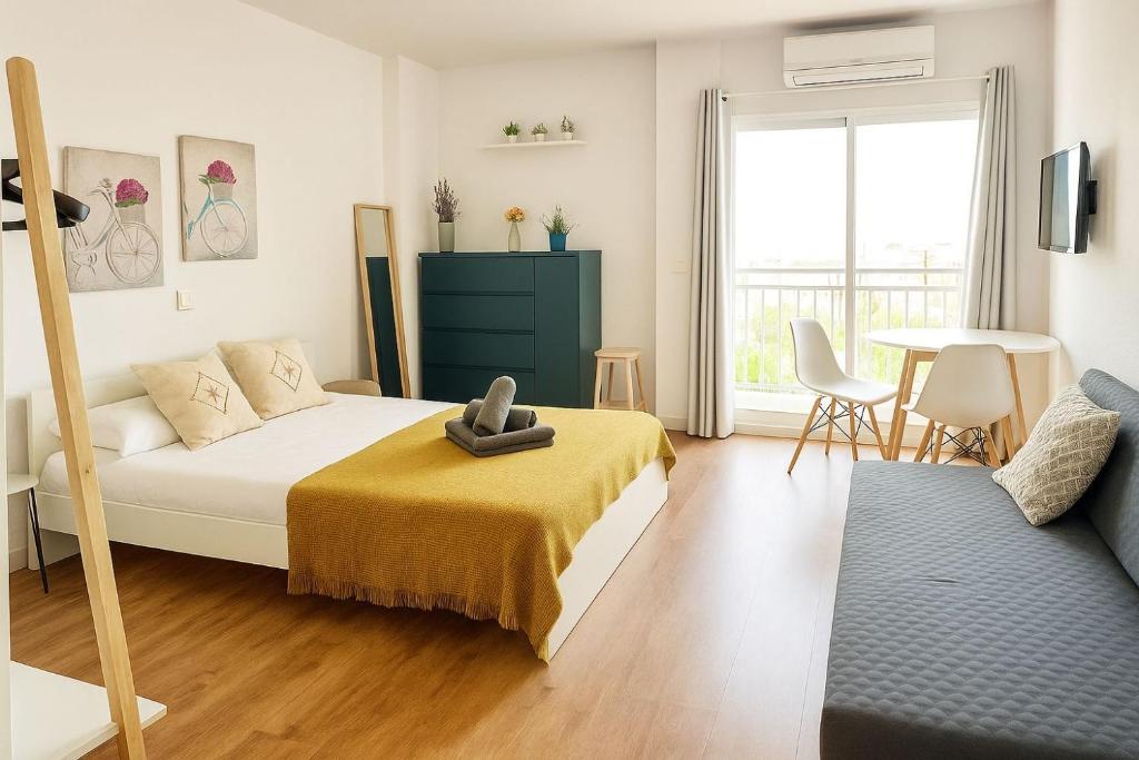 Ένα ή περισσότερα κρεβάτια σε δωμάτιο στο LUXURY SUITES MINERVA, Terraza Privada con Vistas Espectaculares - Comodidad y Estilo cerca de Todo"