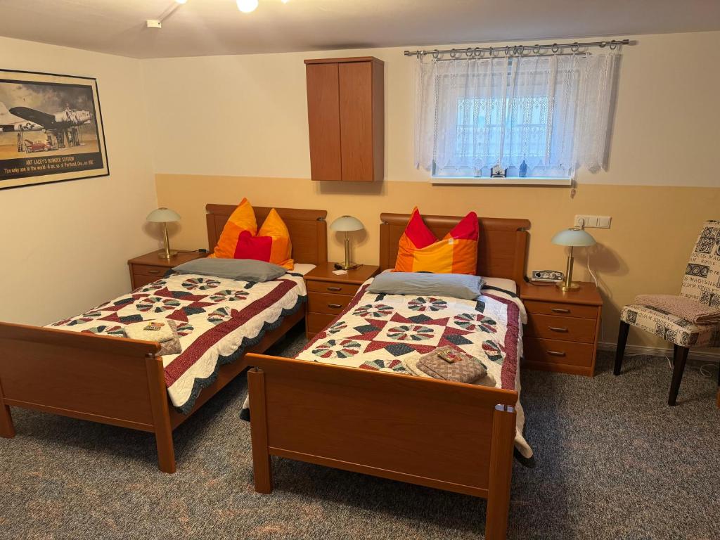 Ένα ή περισσότερα κρεβάτια σε δωμάτιο στο Gästezimmer Neumann