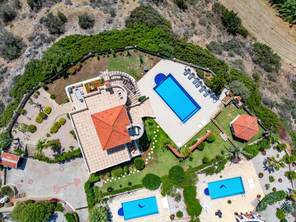 an aerial view of an estate with a pool at Sunset Poseidon by Carrington in Kyrenia