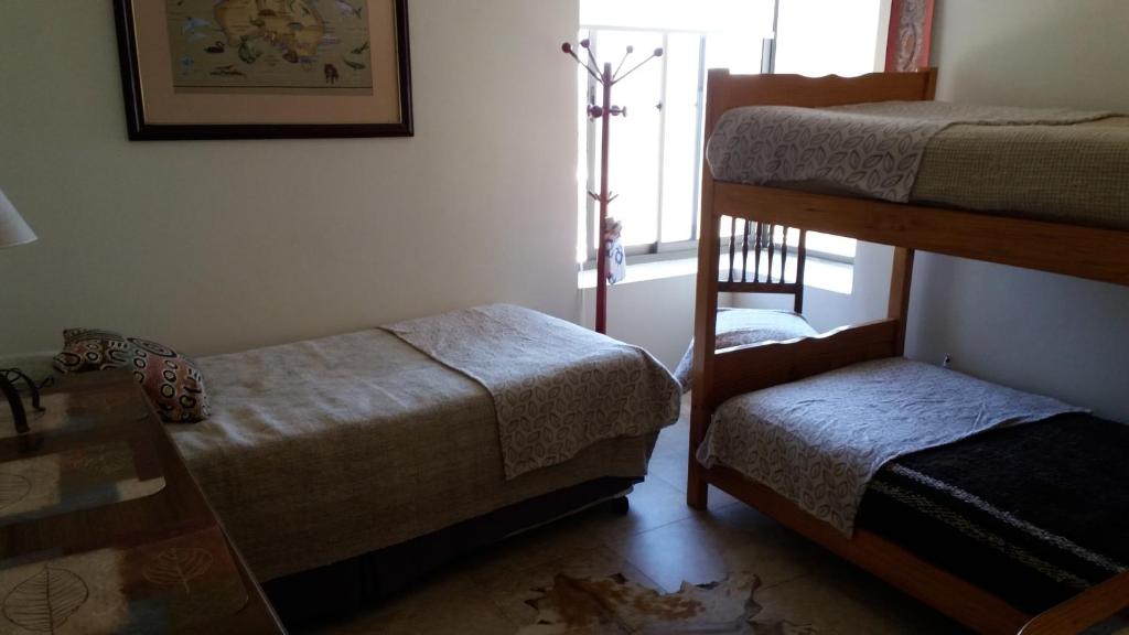 Postel nebo postele na pokoji v ubytování Maitencillo Opas Apartment