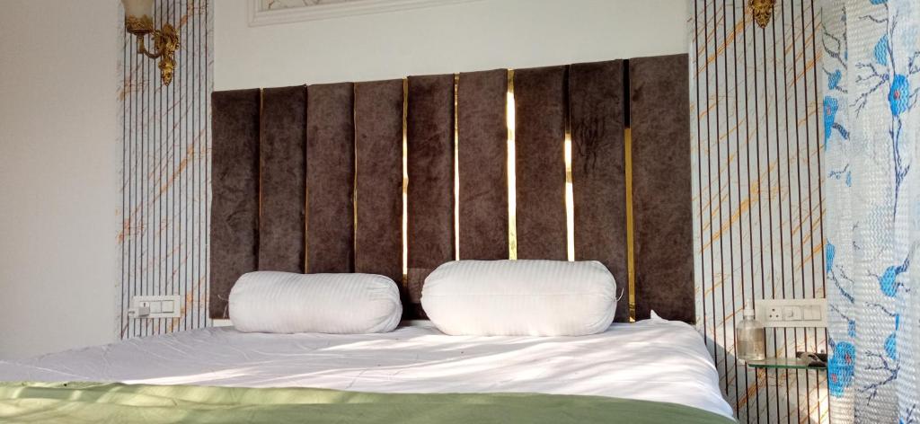 Ένα ή περισσότερα κρεβάτια σε δωμάτιο στο Hariparbatview