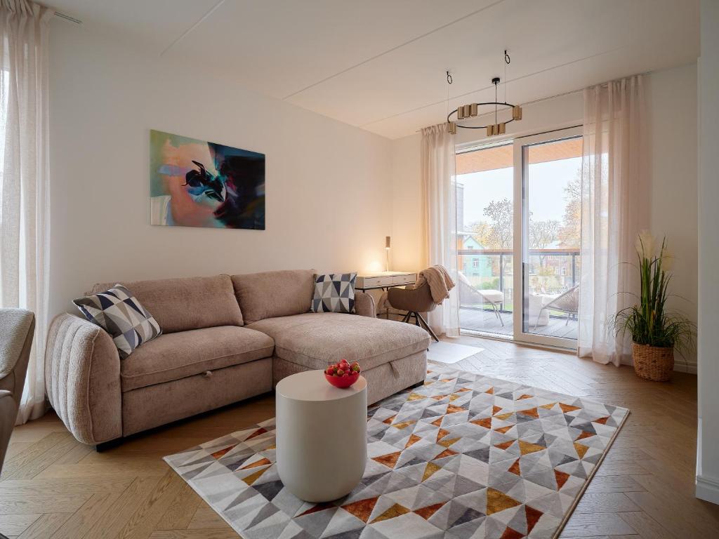 Posezení v ubytování Kotzebue Stay - Kalamaja Luxury - Bold & Refined