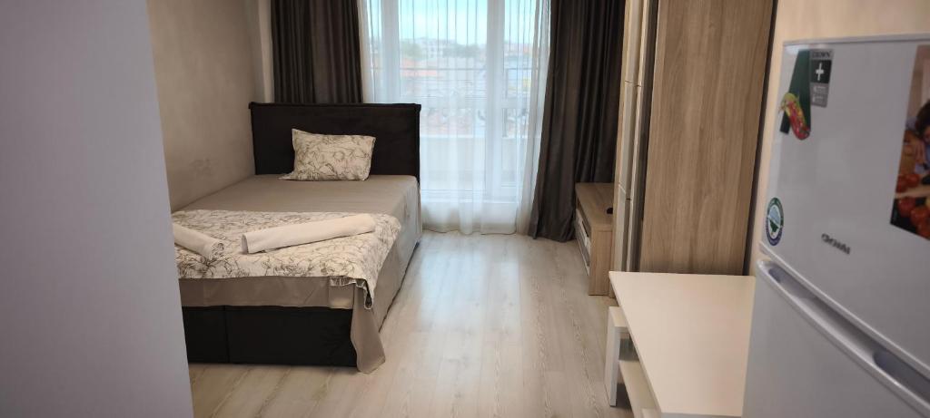Ένα ή περισσότερα κρεβάτια σε δωμάτιο στο Studio 25 Hristo Stanechev 2- Dental University
