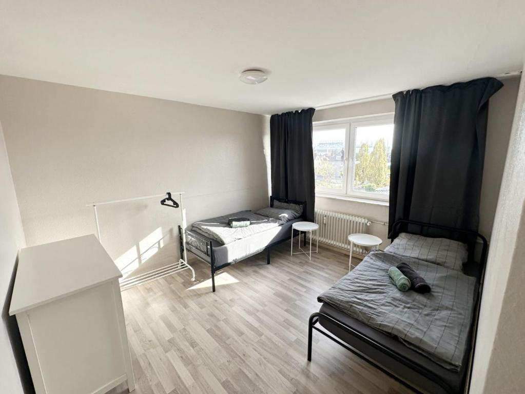 a living room with a couch and a table at Monteurunterkunft in Raunheim in Raunheim