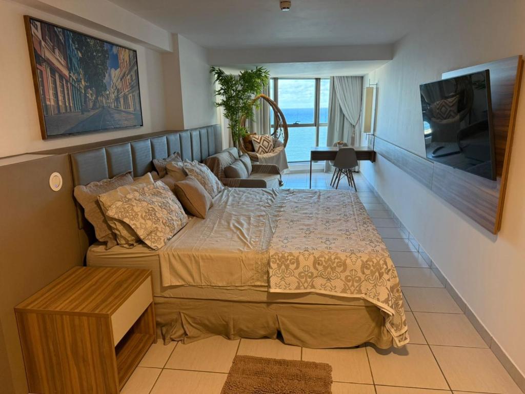 Μια τηλεόραση ή/και κέντρο ψυχαγωγίας στο BCE Flat Beira Mar Boa Viagem