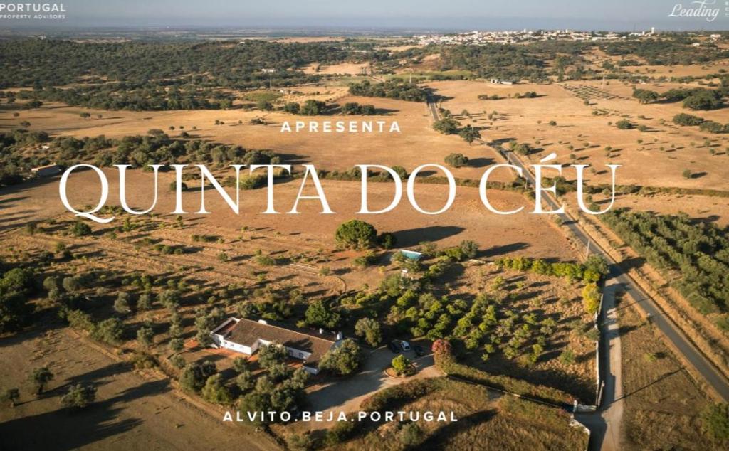 an aerial view of a countryside with the words guinea doherty at Quinta do Céu Tranquilidade e Piscina no Alentejo in Alvito