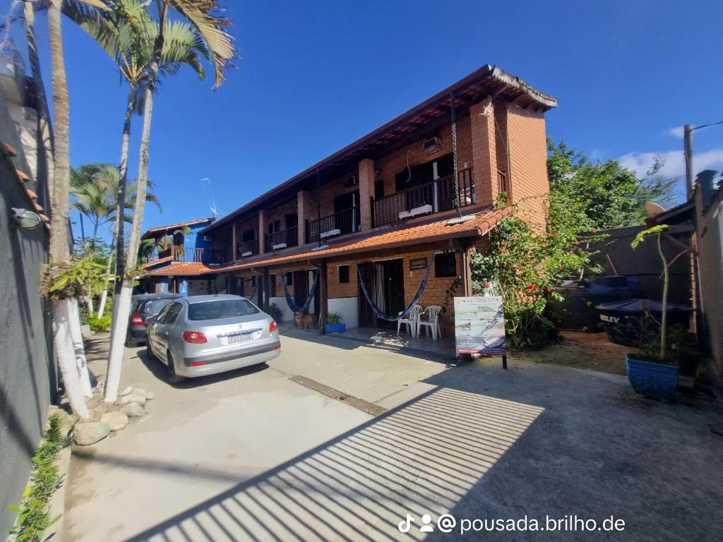 a car parked in front of a building at Pousada Brilho De Paraty in Paraty